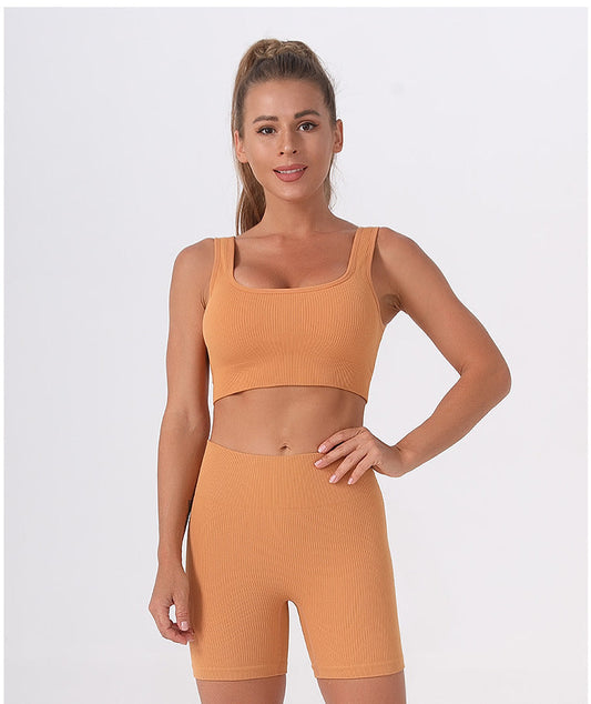 Set sportivo a vita alta completa di leggings corti e reggiseno