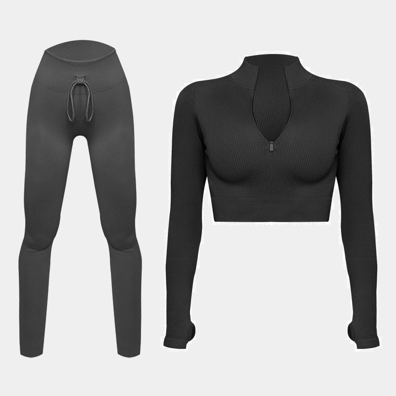Tutta sportiva con top a maniche lunghe e pantaloni leggings a vita alta
