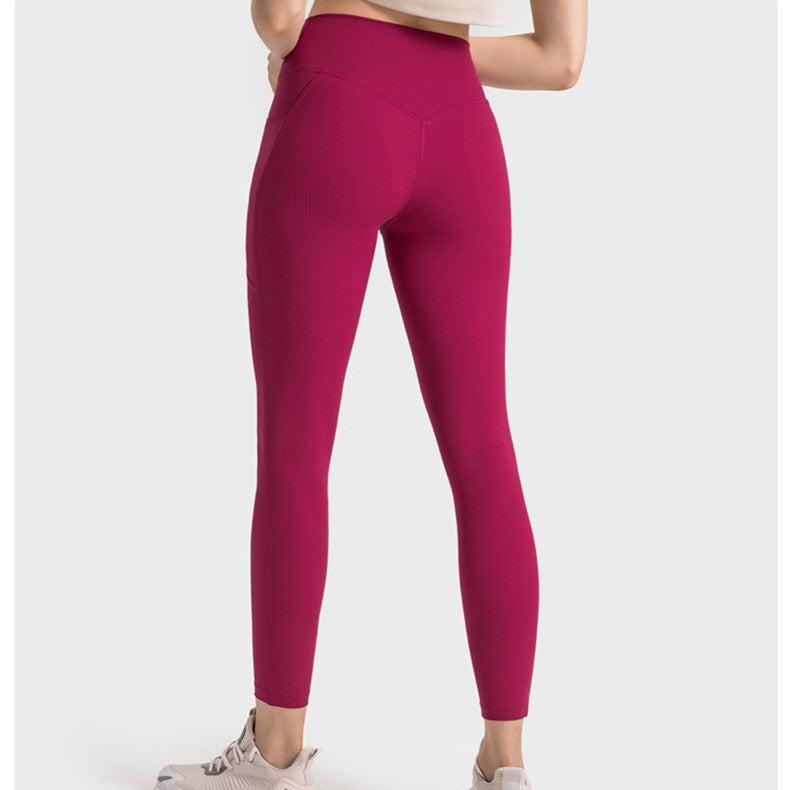 Leggings a vita alta con tasche ad alte prestazioni