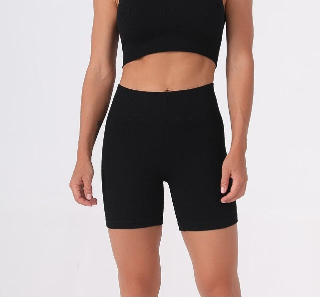 Set sportivo a vita alta completa di leggings corti e reggiseno