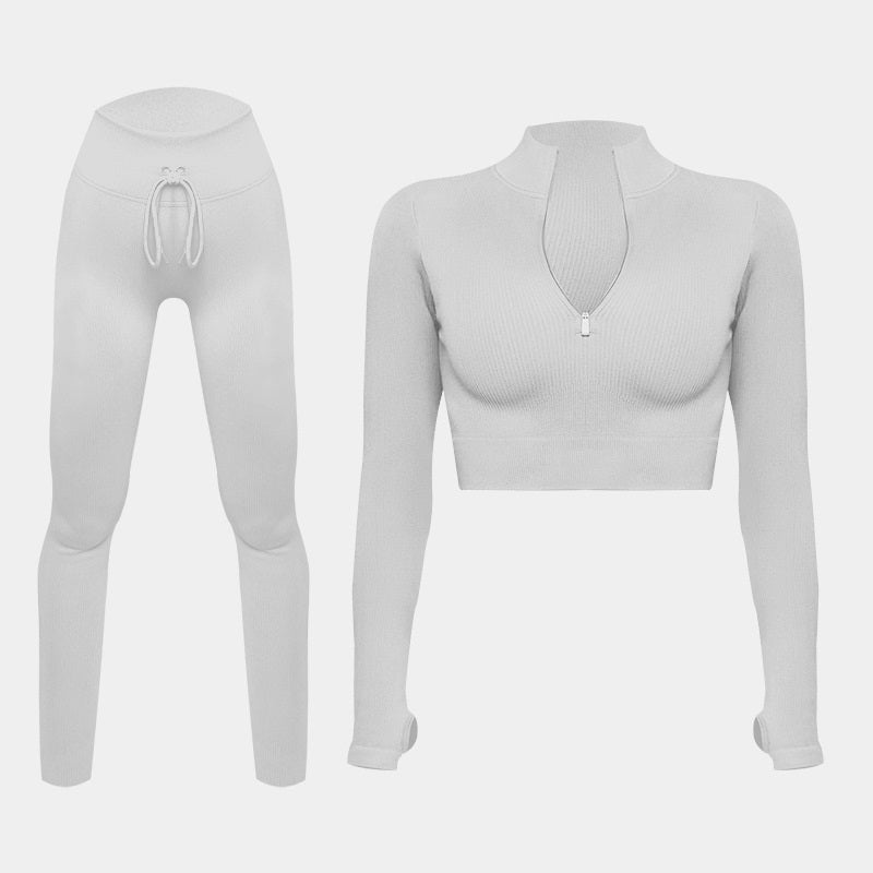Tutta sportiva con top a maniche lunghe e pantaloni leggings a vita alta